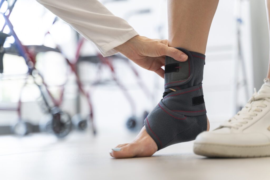Interior of an orthopedics store with a close-up of a woman's foot with a sports ankle brace