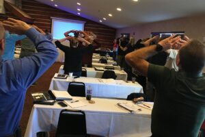 Peak Ergonomics safety seminar attendees stretch